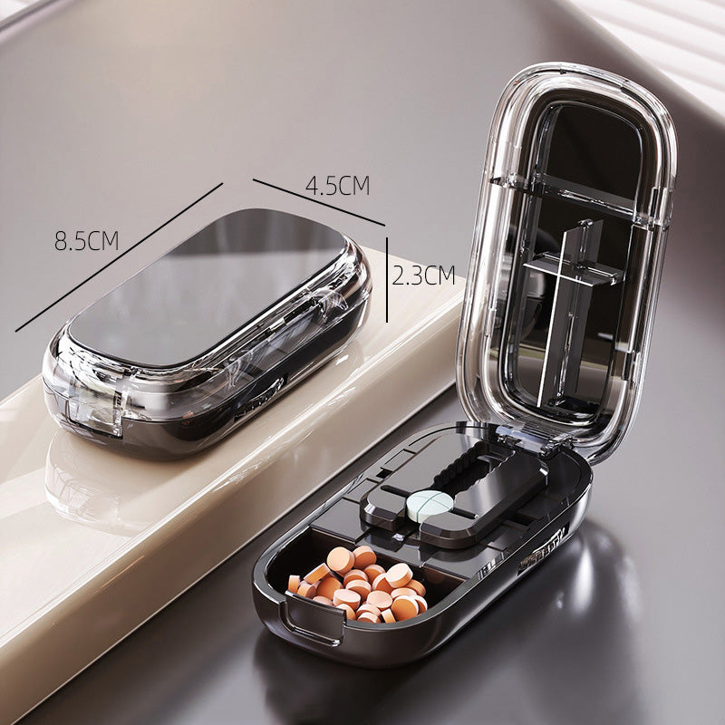 Pilulier portable avec coupeur