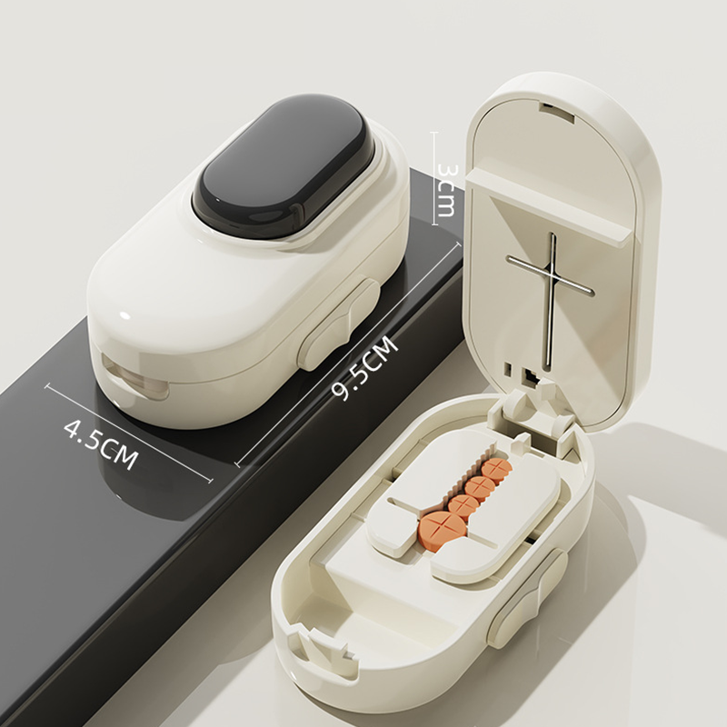 Coupe-comprimés et étui de rangement 2 en 1