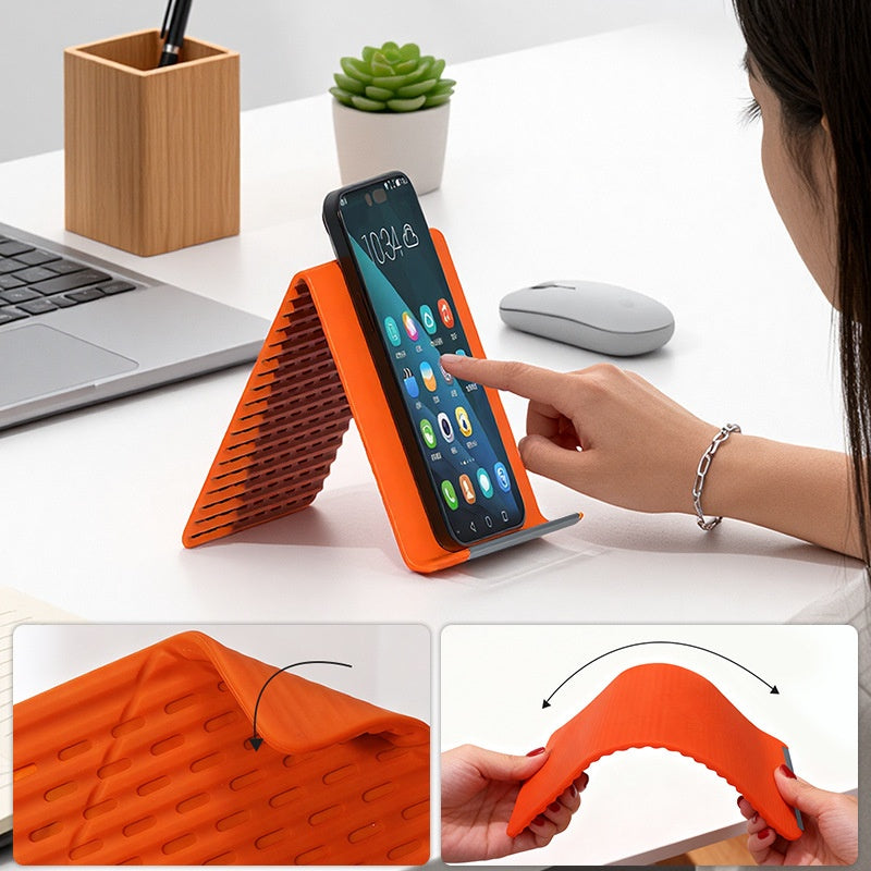 🥳 Best-seller 2026 🥳💞 Plus de 50 000 exemplaires vendus ! 🛋️✨ 54 % de réduction ! Support de téléphone pliable en silicone — Réglez l'angle à votre guise pour soulager les douleurs cervicales. Ultra-compact, conception antidérapante. 📱🛡️